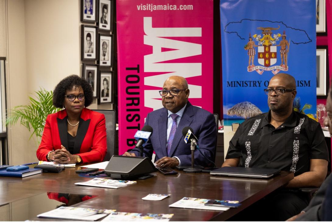 Hon. Edmund Bartlett (centre), Minister of Tourism, addresses the media during a press briefing for the 2025 Global Tourism Resilience Conference, set to be held in Hanover from February 16-19, 2025. Joining him are Jennifer Griffith (left), Permanent Secretary in the Ministry of Tourism, and Professor Lloyd Waller (right), Executive Director of the Global Tourism Resilience and Crisis Management Centre (GTRCMC).