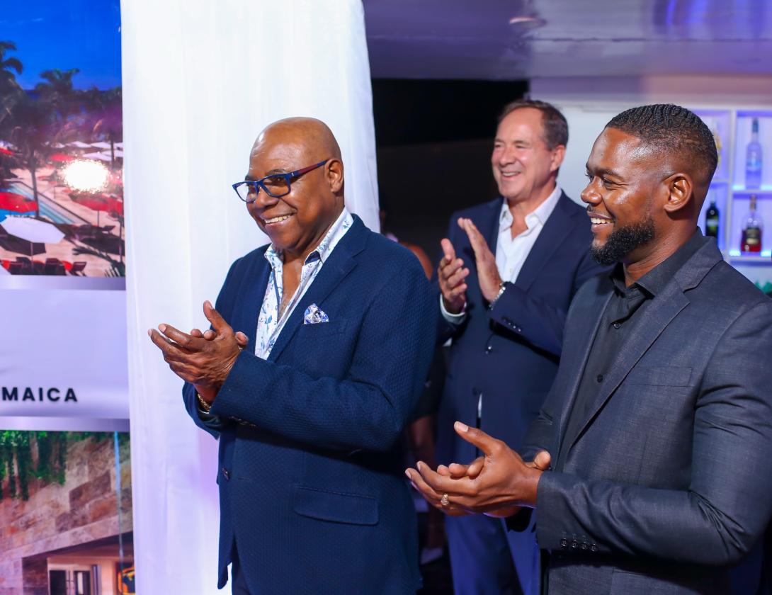 Minister of Tourism, Hon. Edmund Bartlett (left); owner of S Hotel, Chris Issa (centre) and Mayor of Montego Bay, Richard Vernon, join in applauding the all-Jamaican management and staff for their dedication and passion, resulting in the hotel being named the second-best all-inclusive resort in the Caribbean for 2025 by USA Today. The occasion was a cocktail reception to mark the occasion on Wednesday, January 8, 2025, at the hotel.